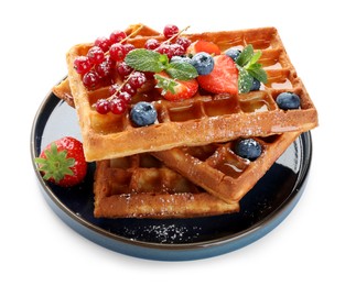 Photo of Delicious Belgian waffles with berries on white background