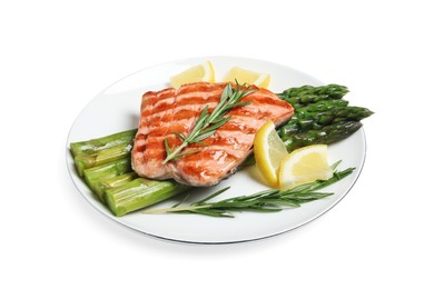 Tasty grilled salmon with asparagus, lemon and rosemary on white background