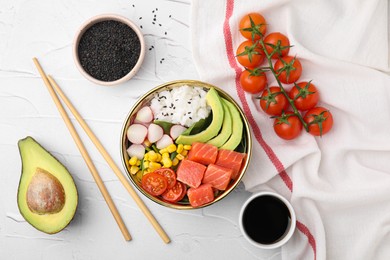 Photo of Delicious poke bowl with salmon, avocado and vegetables on white textured table, flat lay
