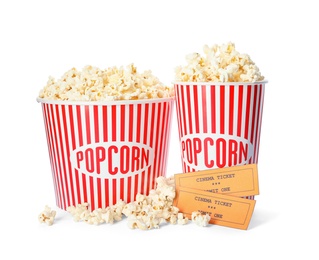 Fresh popcorn and tickets on white background. Cinema snack