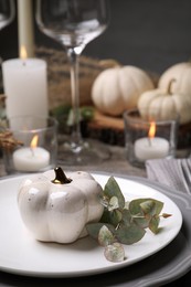 Beautiful autumn place setting and decor on table