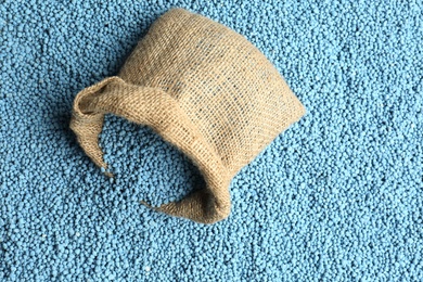 Sack bag and granular mineral fertilizer, top view