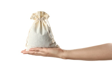 Woman holding full cotton eco bag on white background, closeup