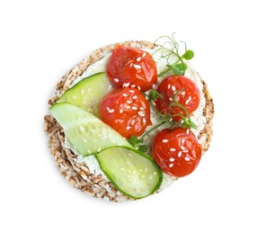 Crunchy buckwheat cakes with cream cheese, tomatoes and cucumber slices isolated on white, top view