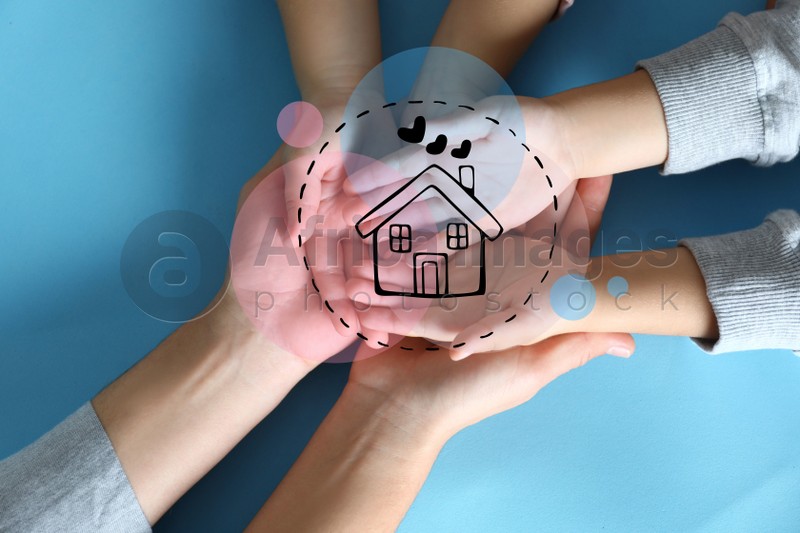 Illustration of house and happy family holding hands on blue background, top view
