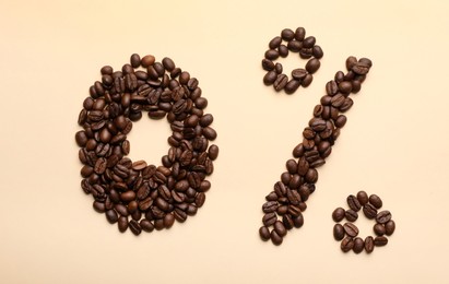 0 percent made of coffee beans on beige background, flat lay. Decaffeinated drink