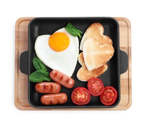 Romantic breakfast with fried sausages, heart shaped egg and toasts isolated on white, top view. Valentine's day celebration