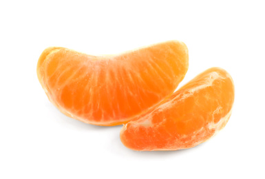 Photo of Fresh juicy tangerine segments isolated on white