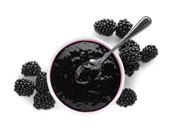 Blackberry puree in bowl and fresh berries on white background, top view