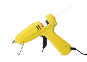 Yellow glue gun with stick isolated on white