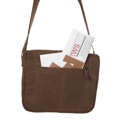 Brown postman bag with mails and newspaper on white background