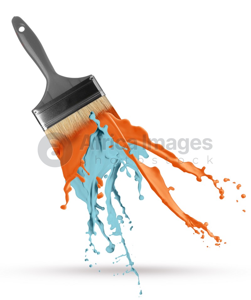 Brush with splashing orange and light blue paints on white background