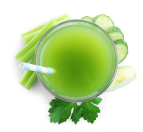 Photo of Glass of celery juice and fresh ingredients on white background, top view