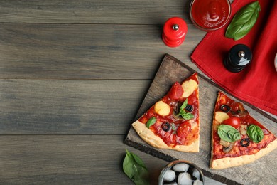Photo of Slices of delicious pita pizza on wooden table, flat lay. Space for text