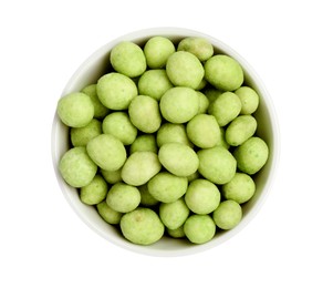 Tasty wasabi coated peanuts in bowl on white background, top view