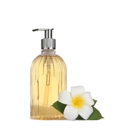 Stylish dispenser with liquid soap and flower on white background