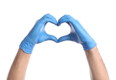 Photo of Doctor in medical gloves making heart with hands on white background, closeup