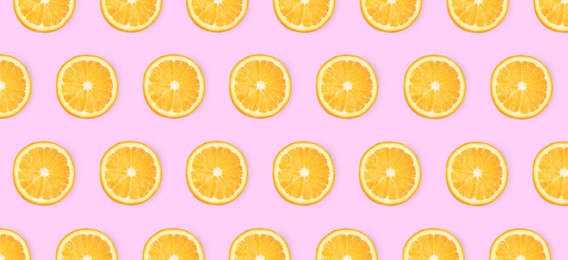 Slices of oranges on pink background, flat lay. Banner design
