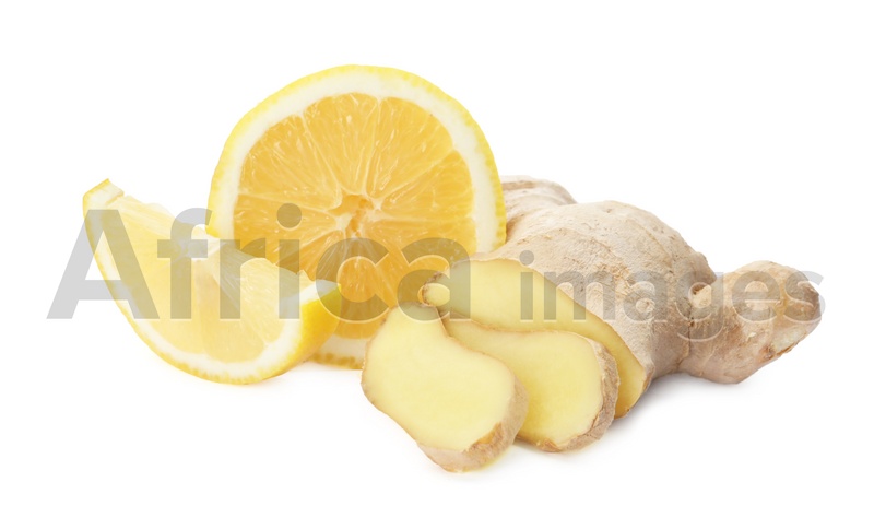 Photo of Fresh lemon and ginger on white background