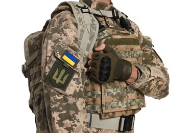 Soldier in Ukrainian military uniform with backpack on white background, closeup