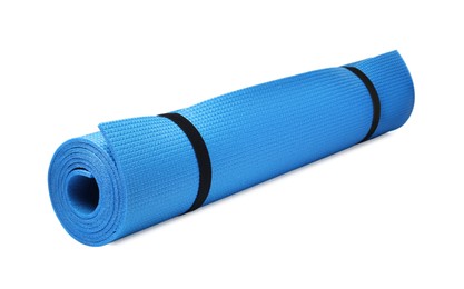 Rolled light blue camping mat isolated on white