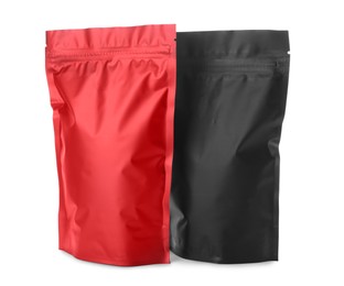 Black and red resealable foil packages isolated on white