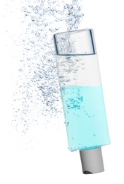Bottle of micellar water with bubbles on white background