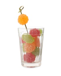 Delicious gummy candies in glass on white background