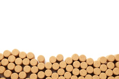 Wine bottle corks on white background, top view