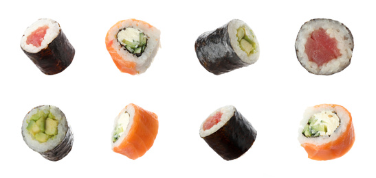 Set of different delicious sushi rolls on white background