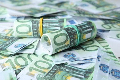 Photo of 100 Euro banknotes as background, closeup. Money exchange