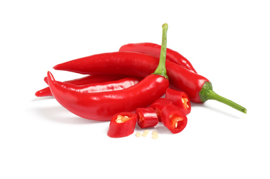Photo of Ripe red hot chili peppers isolated on white