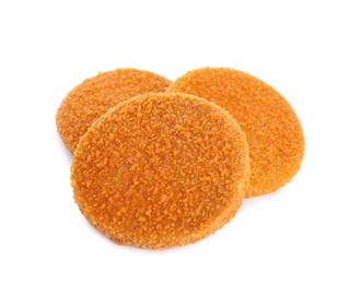 Delicious fried breaded cutlets on white background