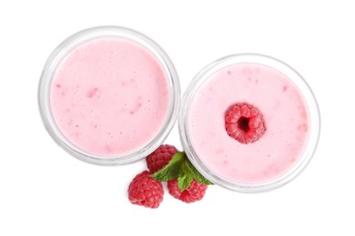 Tasty fresh raspberry smoothie in glasses on white background, top view