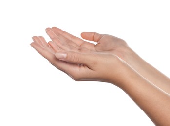 Woman holding her hands against white background, closeup