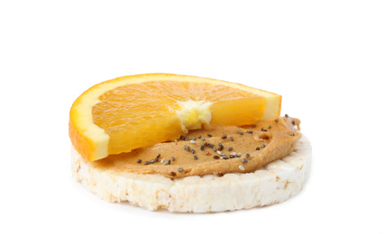 Puffed rice cake with peanut butter and orange isolated on white