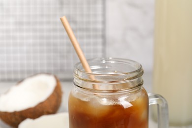 Photo of Mason jar of delicious iced coffee, closeup