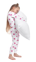 Photo of Girl in pajamas hugging pillow on white background