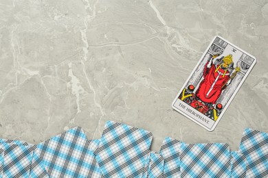 The Hierophant and other tarot cards on light grey marble table, flat lay. Space for text