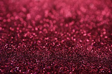 Shiny pink glitter as background. Bokeh effect