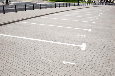 Photo of Outdoor car parking lots with white marking lines