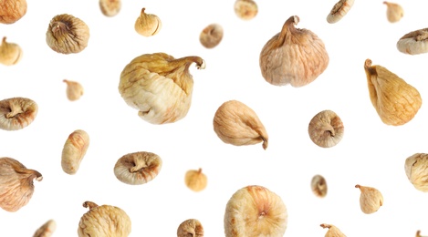 Dried fig fruits falling on white background. Banner design