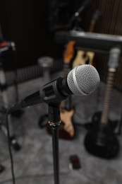 Modern microphone at recording studio. Music band practice
