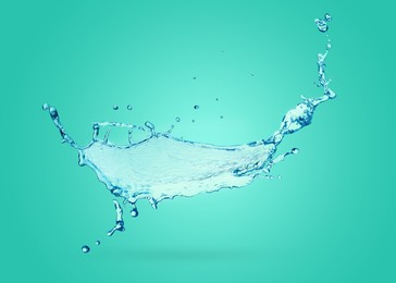 Splash of pure water on turquoise background