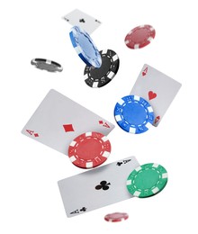 Image of Casino chips and playing cards falling on white background