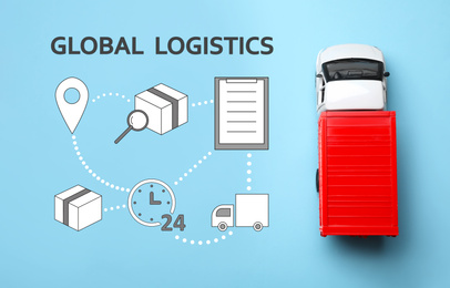 Global logistics concept. Truck and icons on light blue background