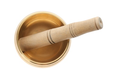 Golden singing bowl and mallet on white background, top view. Sound healing