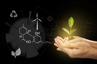 Image of Illustration of chemical formula and man with his child holding soil with green plant in hands on black background, closeup