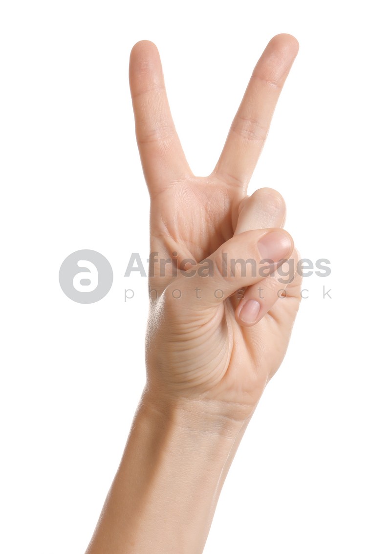 Photo of Woman showing two fingers on white background, closeup of hand