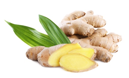 Aromatic fresh ginger with green leaves on white background 